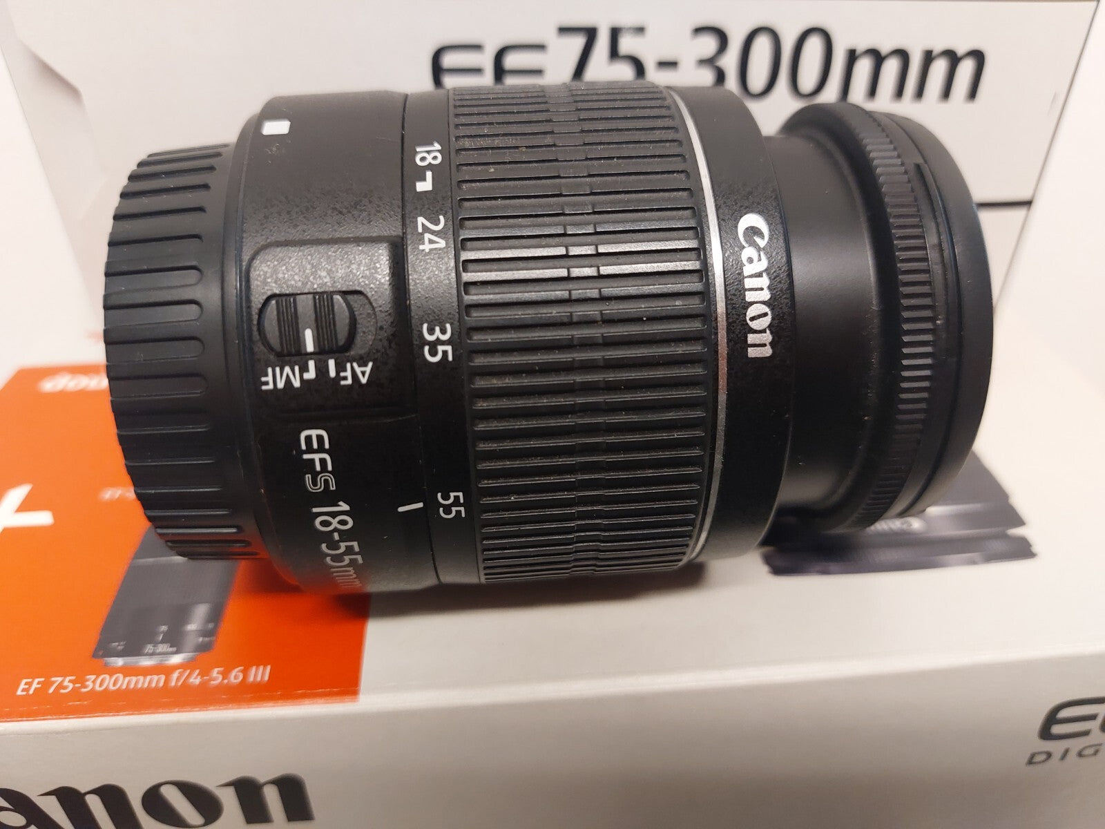 MACCHINA FOTOGRAFICA  CANON EOS1100D CON 2 OTTICHE  BORSA  TRACOLLA  ORIGINALE