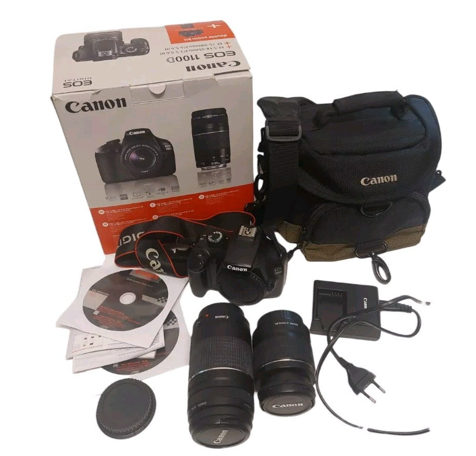 MACCHINA FOTOGRAFICA  CANON EOS1100D CON 2 OTTICHE  BORSA  TRACOLLA  ORIGINALE